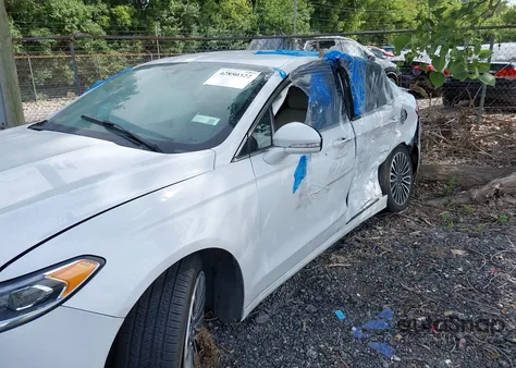 2017 Ford Fusion Titanium z USA, uszkodzony, nr VIN 3FA6P0K91HR115631